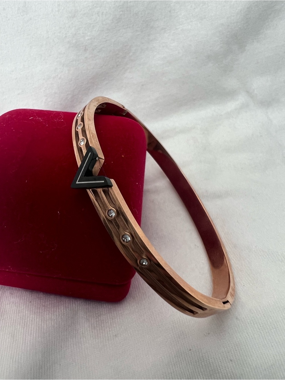 Rose Gold-tone Hinged Bangle Bracelet with Black Chevron Accent and Crystals